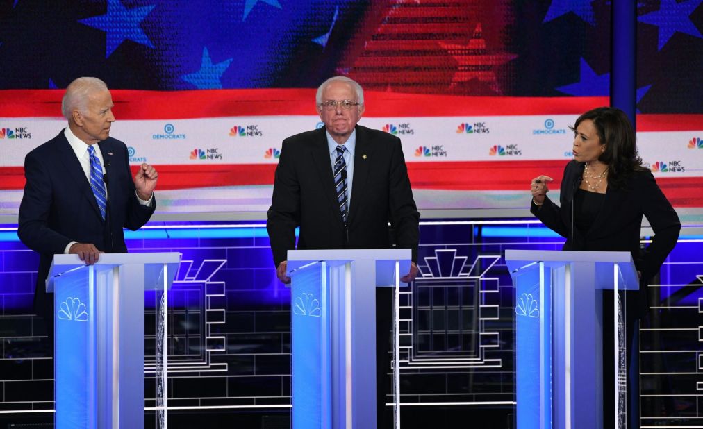 Harris confronts former Vice President Joe Biden, left, during the first Democratic debates in June 2019. Harris <a href="https://www.cnn.com/politics/live-news/democratic-debate-june-27-2019/h_b381d219b33e3de6757b4feb63036316" target="_blank">went after Biden</a> over his early-career opposition to federally mandated busing.