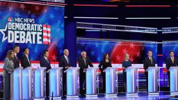 MIAMI, FLORIDA - JUNE 27: Democratic presidential candidates (L-R) Marianne Williamson, former Colorado governor John Hickenlooper, former tech executive Andrew Yang, South Bend, Indiana Mayor Pete Buttigieg, former Vice President Joe Biden, Sen. Bernie Sanders (I-VT), Sen. Kamala Harris (D-CA), Sen. Kirsten Gillibrand (D-NY), Sen. Michael Bennet (D-CO) and Rep. Eric Swalwell (D-CA) take part in the second night of the first Democratic presidential debate on June 27, 2019 in Miami, Florida.  A field of 20 Democratic presidential candidates was split into two groups of 10 for the first debate of the 2020 election, taking place over two nights at Knight Concert Hall of the Adrienne Arsht Center for the Performing Arts of Miami-Dade County, hosted by NBC News, MSNBC, and Telemundo. (Photo by Drew Angerer/Getty Images)