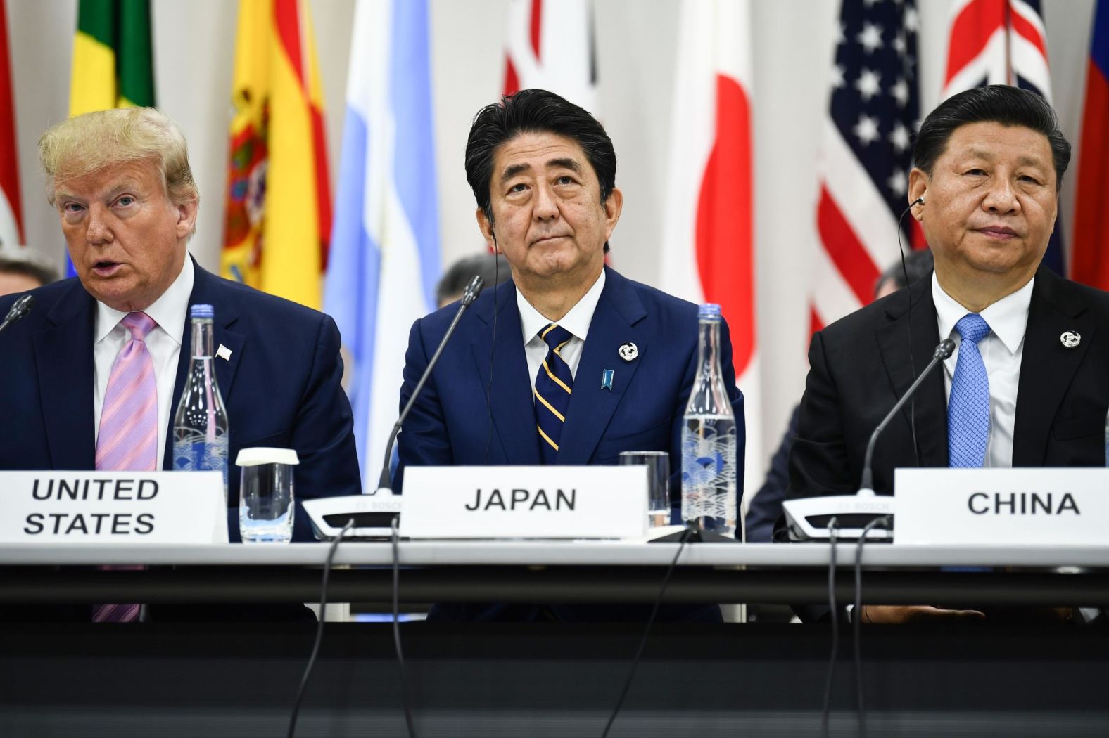President Trump, Japan's Shinzo Abe and China's Xi Jinping attend a meeting at the G20 summit. 