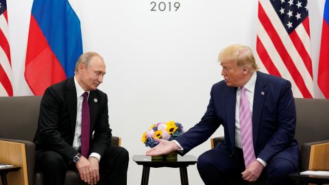 Russia's President Vladimir Putin and US President Donald Trump talk during a bilateral meeting at the G20 leaders summit in Osaka, Japan, June 28, 2019. 