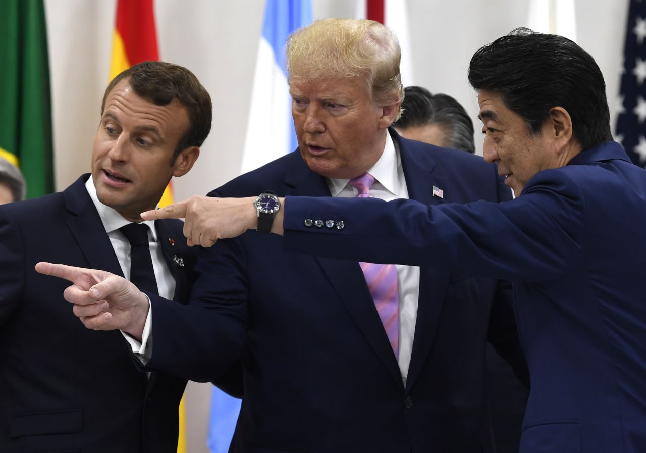 Emmanuel Macron, Trump and Abe speak Friday before a working session at the G20 summit.