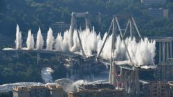 Explosive charges blow up the eastern pylons of Genoa's Morandi motorway bridge on June 28, 2019 in Genoa. - Some of the remains of Genoa's Morandi motorway bridge are set to be destroyed on June 28 almost eleven months after its partial collapse during a storm killed 43 people and injured dozens. (Photo by Vincenzo PINTO / AFP)        (Photo credit should read VINCENZO PINTO/AFP/Getty Images)