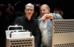 Apple CEO Tim Cook, left, and chief design officer Jonathan Ive look at the Mac Pro in the display room at the Apple Worldwide Developers Conference in San Jose, Calif. 