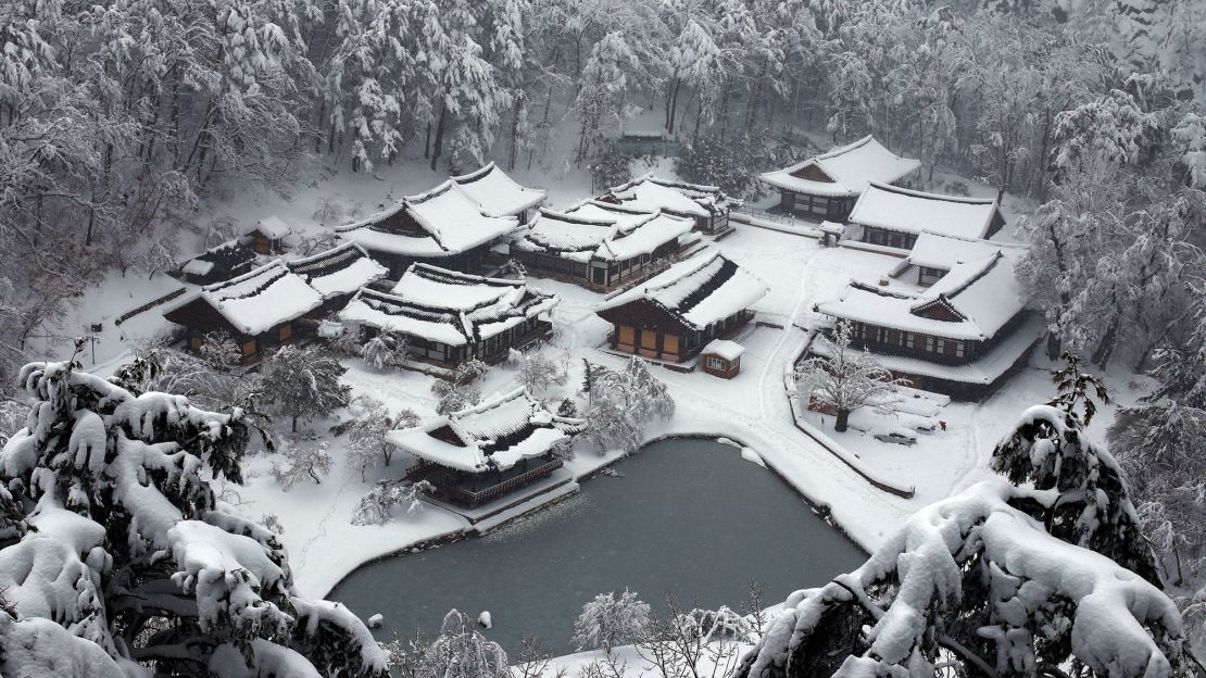 Snow blankets Bulyoungsa Temple in winter.