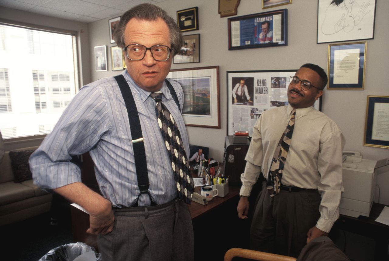 King wears his trademark suspenders at his CNN office in 1995.