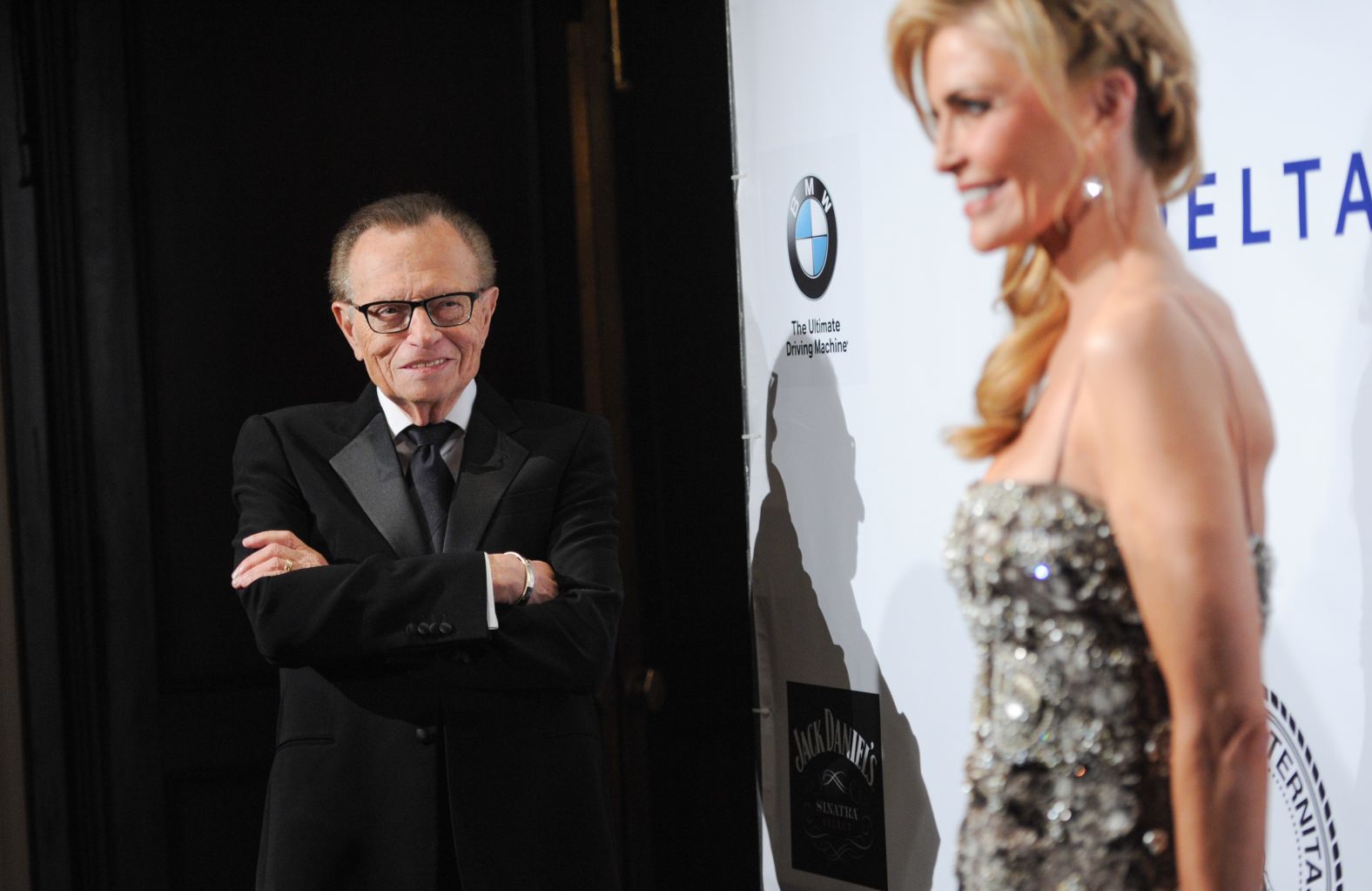 King watches his wife, Shawn, at a red-carpet event in 2014.