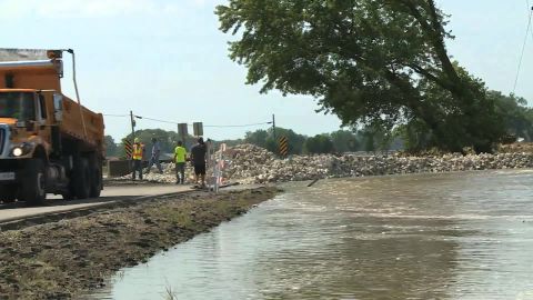 A crew works to repair a levee near Jefferson City, Missouri.