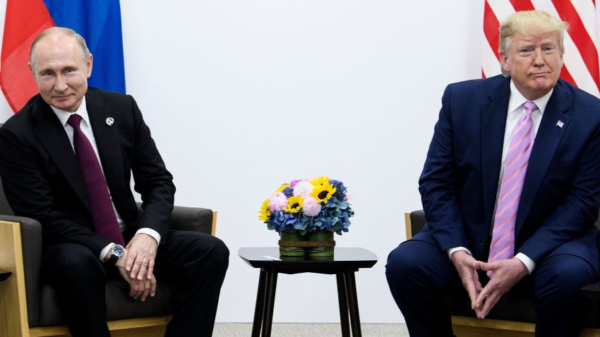 US President Donald Trump (R) attends a meeting with Russia's President Vladimir Putin during the G20 summit in Osaka on June 28, 2019. (Photo by Brendan Smialowski / AFP)        (Photo credit should read BRENDAN SMIALOWSKI/AFP/Getty Images)
