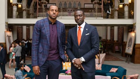 Andre Iguodala takes a photo with Yusef Salaam, a member of the Central Park Five.
