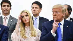 US President Donald Trump (R) and advisor to the President Ivanka Trump (L) attend an event on women's empowerment  during the G20 Summit in Osaka on June 29, 2019. (Photo by Brendan Smialowski / AFP)        (Photo credit should read BRENDAN SMIALOWSKI/AFP/Getty Images)