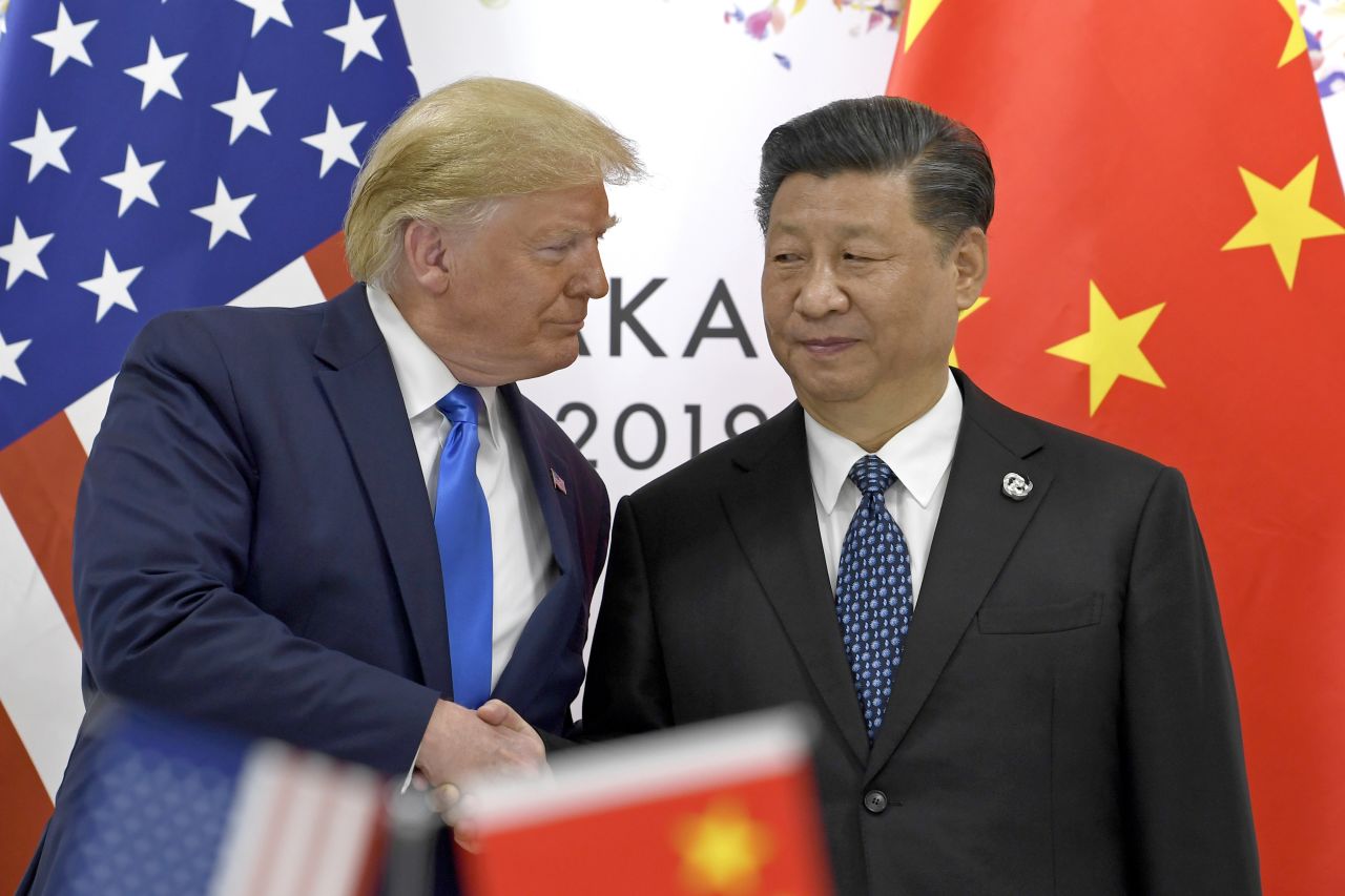 Trump, left, shakes hands with Chinese President Xi Jinping during a meeting Saturday on the sidelines of the G20 summit.