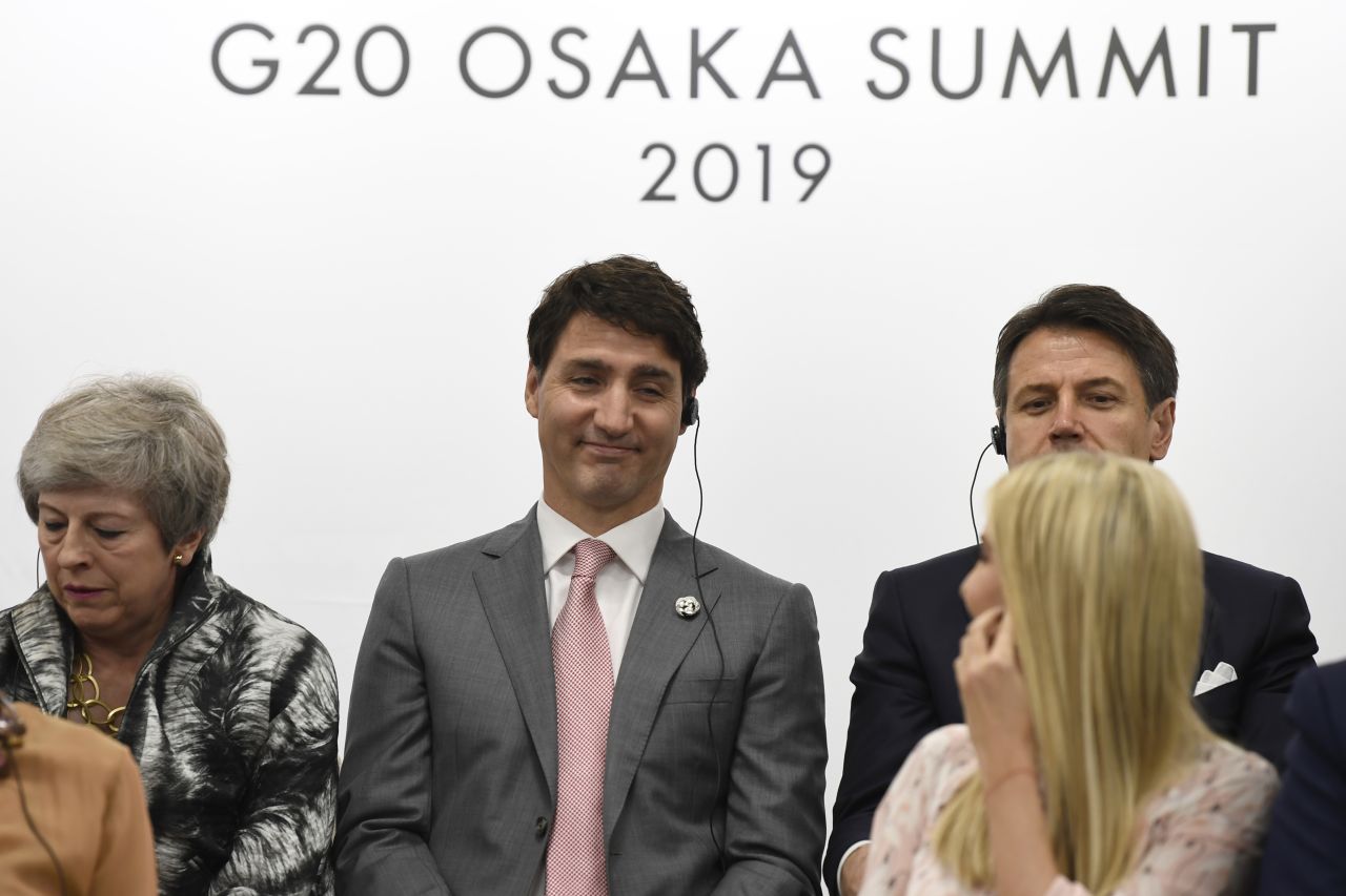 Ivanka Trump talks with Canadian Prime Minister Justin Trudeau on Saturday during a G20 summit event on women's empowerment.