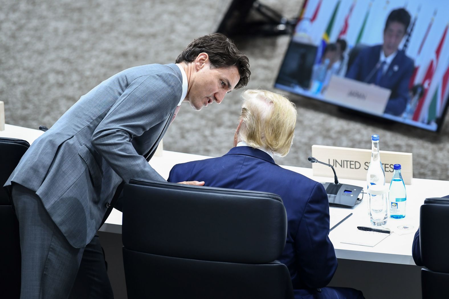 Canadian Prime Minister Justin Trudeau speaks with US President Donald Trump during a session at the G20 summit on Saturday.