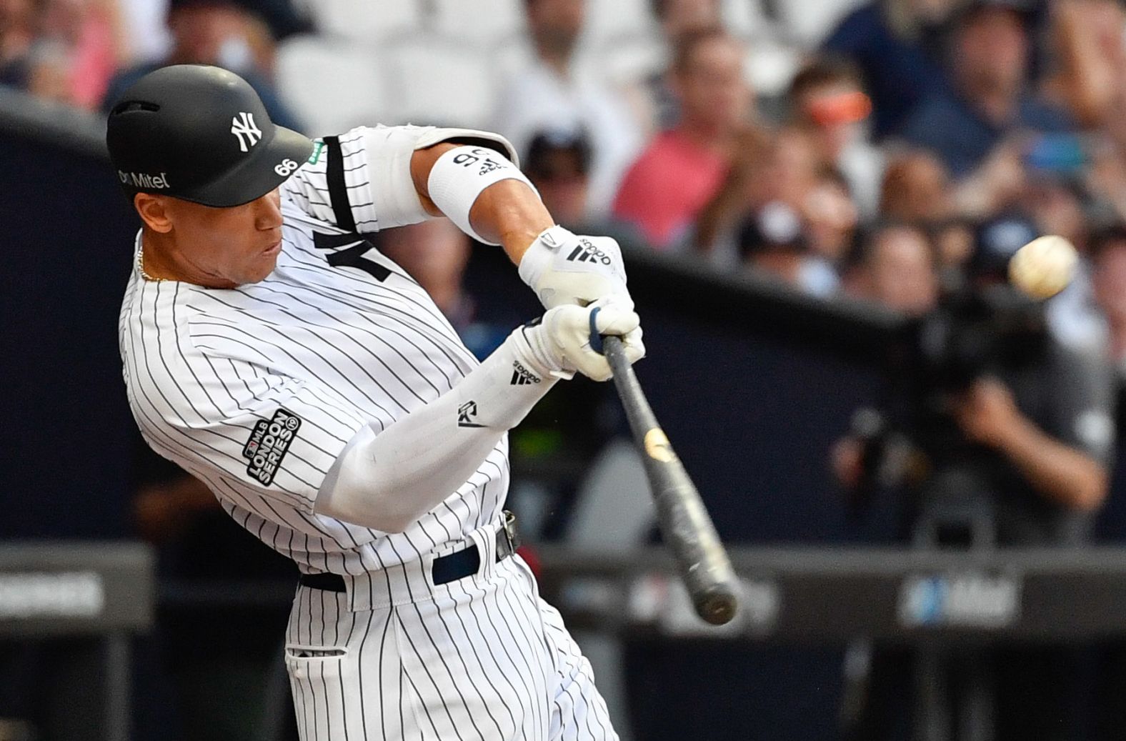 New York Yankees right fielder Aaron Judge hits a two run home run during the fourth inning of game one on June 29.