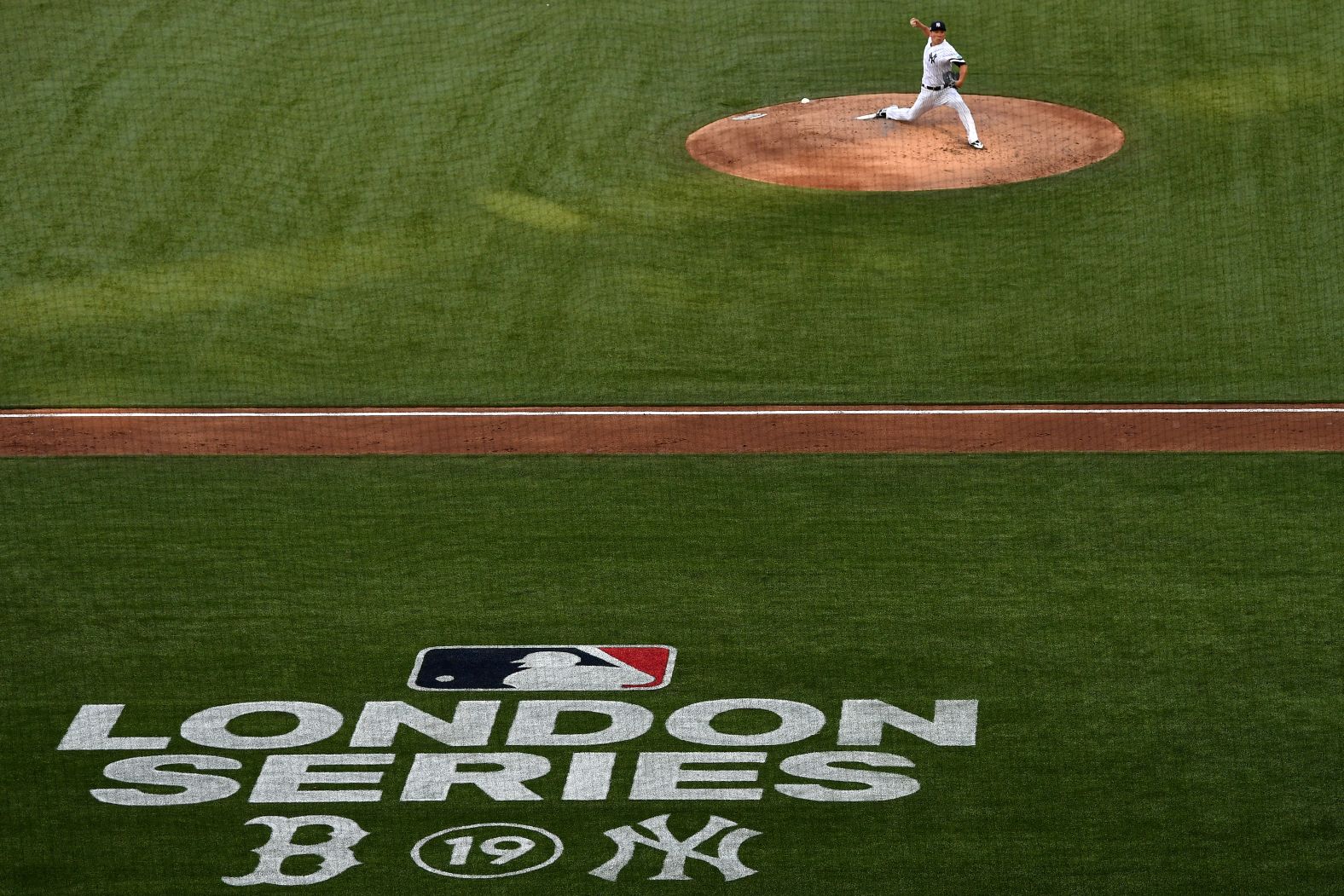 Masahiro Tanaka of the New York Yankees delivers a pitch during game one of the MLB London Series.