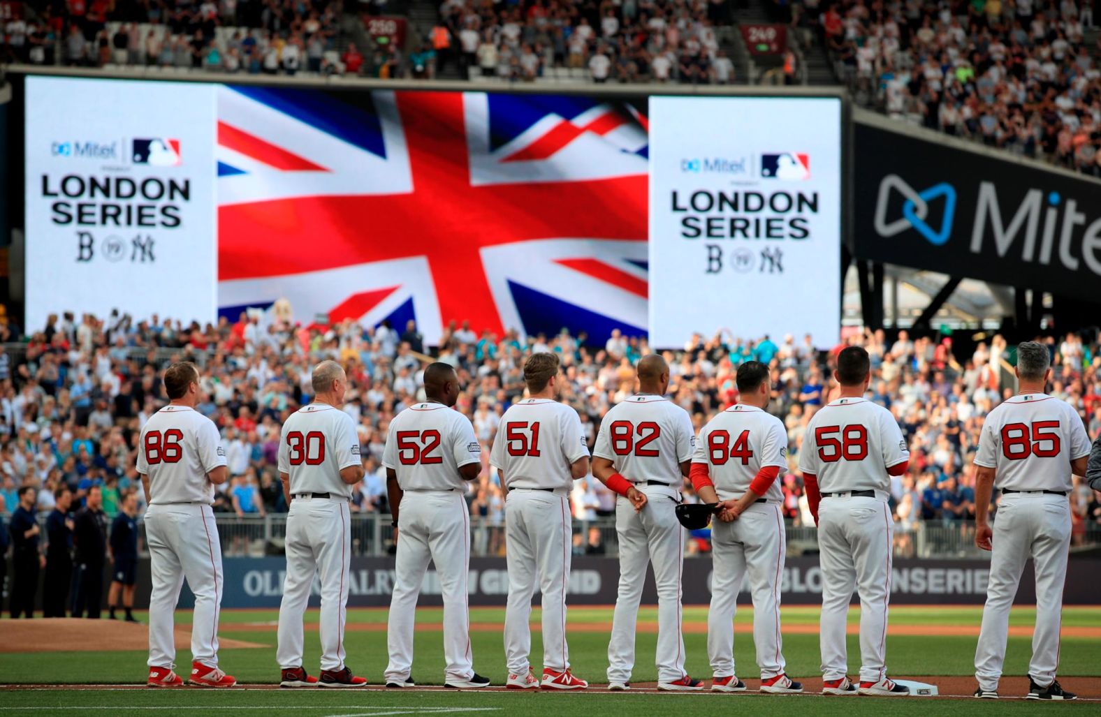 Boston Red Sox players stand for the national anthem before a game one of the first-ever MLB London Series on June 29.