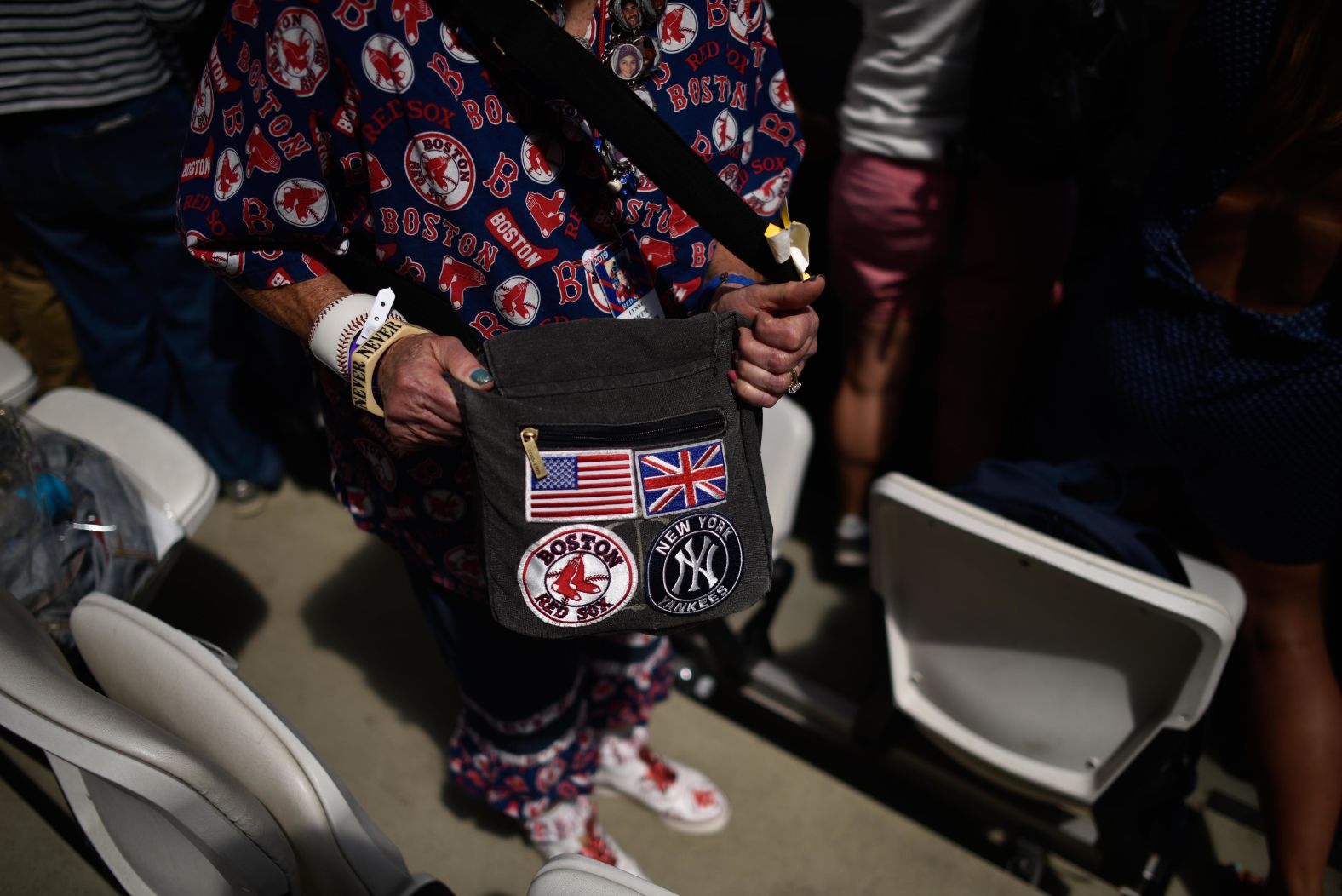 A Boston Red Sox fan shows off her team apparel at London Stadium on Friday, June 28, in London, England.