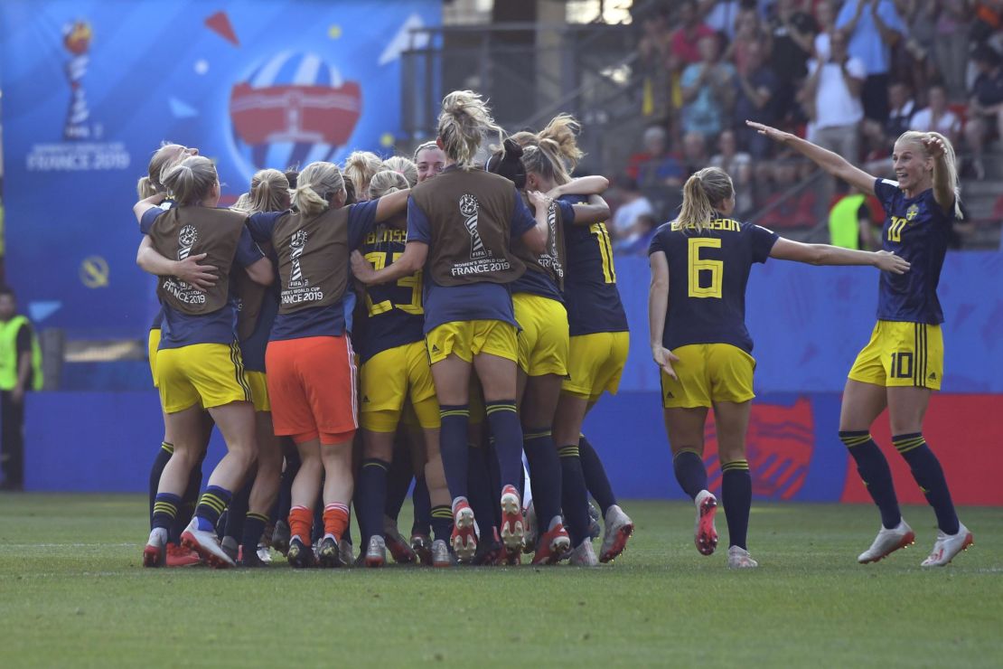 Team Sweden celebrates after beating Germany at the Women's World Cup Saturday. 