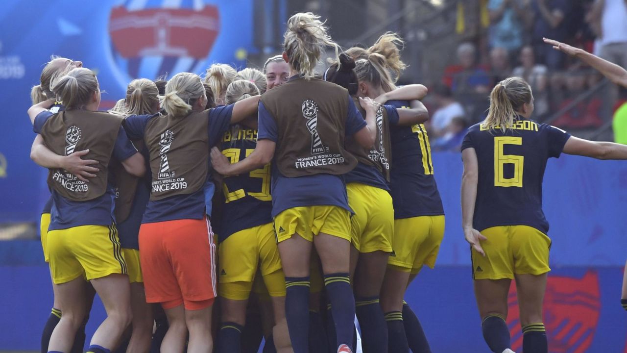 Team Sweden celebrates after beating Germany at the Women's World Cup Saturday.