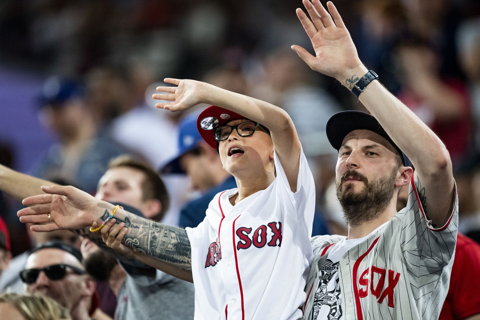 Red Sox fans cheer during game one of the London Series.