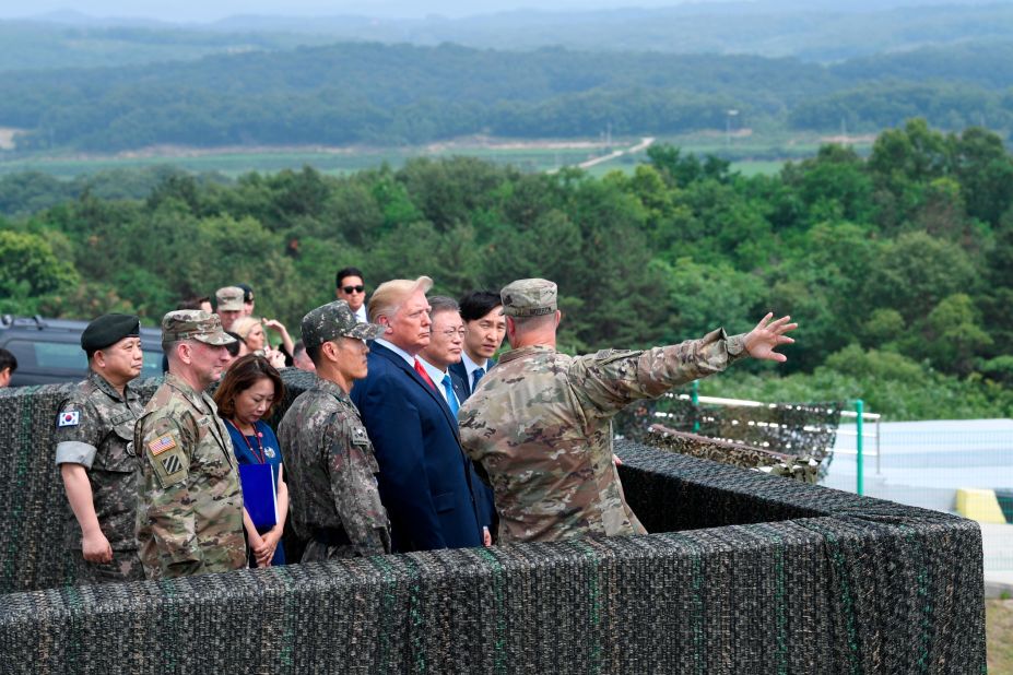Trump views North Korea from from Observation Post Ouellette at Camp Bonifas in South Korea on Sunday, June 30.