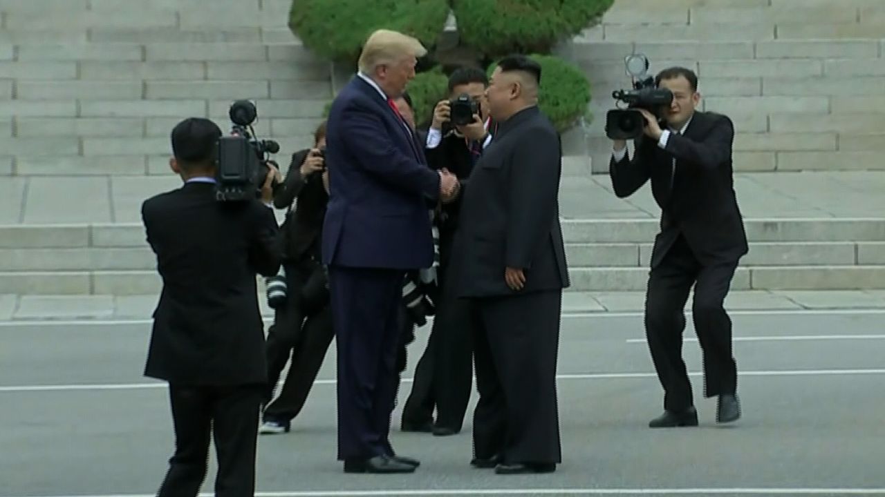 trump kju hand shake