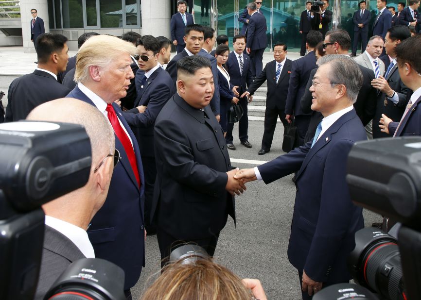 South Korean President Moon Jae-in meets with North Korean leader Kim Jong Un, alongside President Trump at the truce village of Panmunjom in the Korean Demilitarized Zone, on Sunday, June 30.