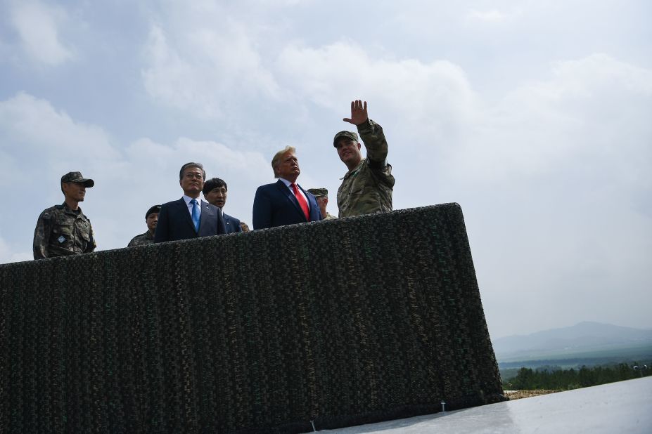 Trump and Moon visit an observation post in the Joint Security Area at Panmunjom in the Demilitarized Zone separating North and South Korea on June 30.