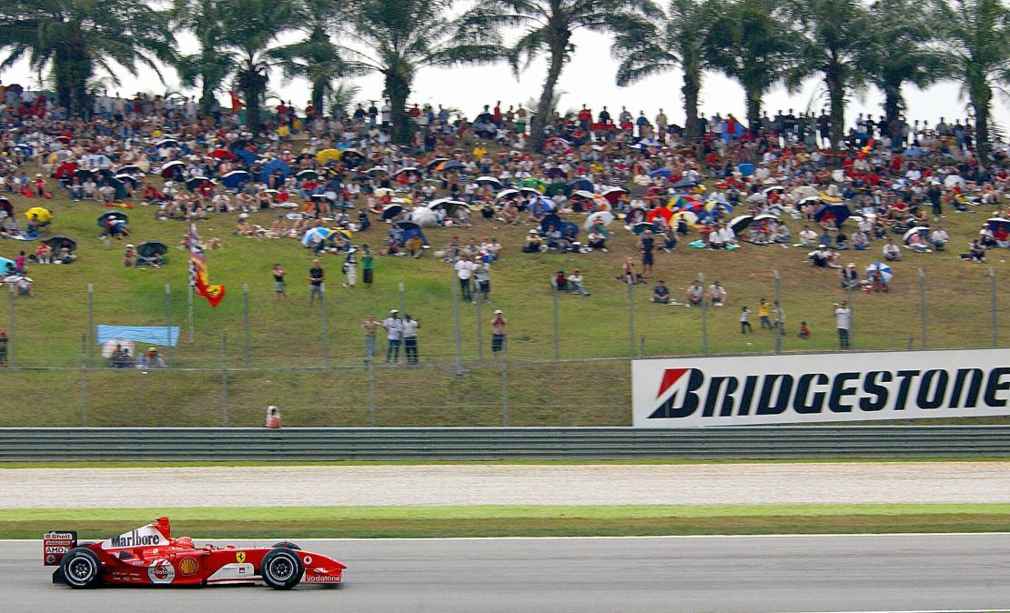 Michael Schumacher rides his F2004 to victory at the Malaysian Grand Prix in 2004. 