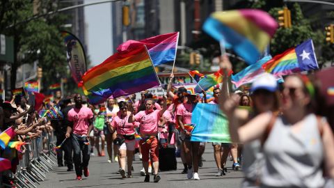 Marchers take part in the 2019 WorldPride parade. 