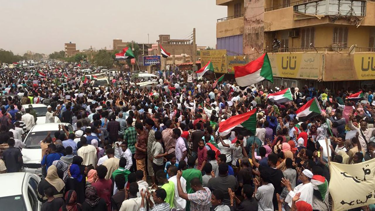 Sudanese protestors chant slogans demanding civilian rule during a rally in Khartoum's southern al-Sahafa district.