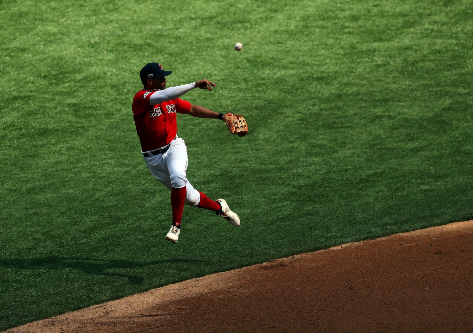 Xander Bogaerts makes a throw during Game 2 of the London Series on Sunday, June 30.