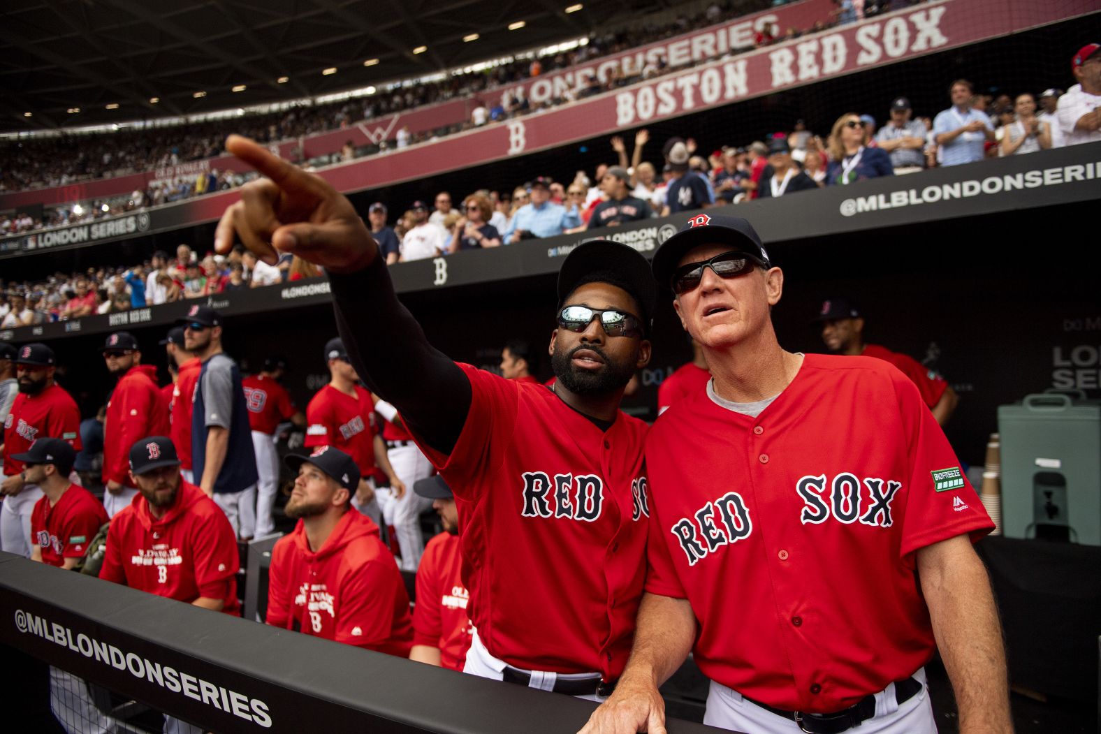 From left, Jackie Bradley Jr. and bench coach Ron Roenicke of the Boston Red Sox look on before Game 2.