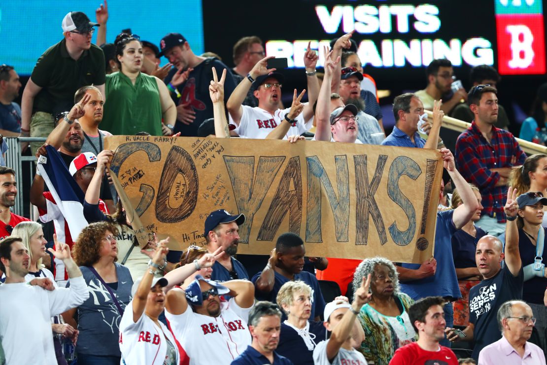 Yankees fans show their support during the MLB London Series game between Boston Red Sox and New York Yankees in London on Saturday. Many attendees traveled from the US to watch the first regular season games held in Europe. 