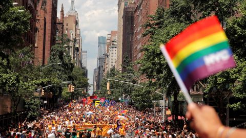 People march down Fifth Avenue.