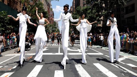 Parade participants march while wearing stilts during the New York City Pride March as part of WorldPride on Sunday, June 30.