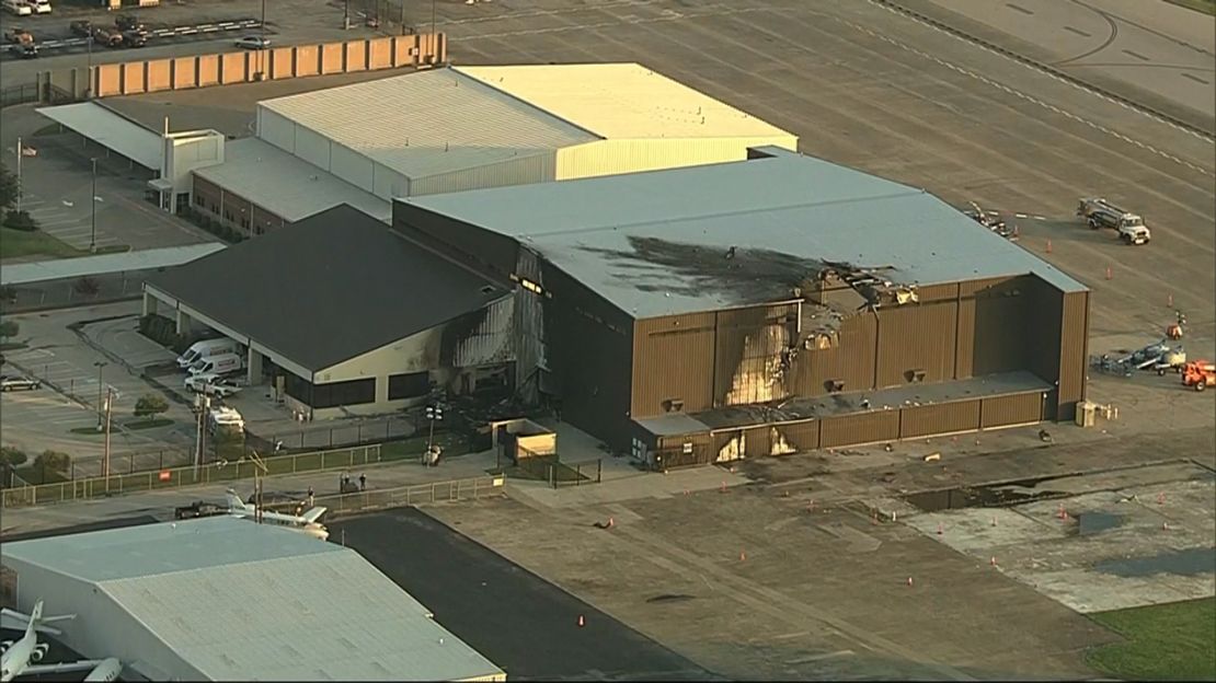 Aerial video from CNN affiliate KTVT shows damage to the hangar after the crash.