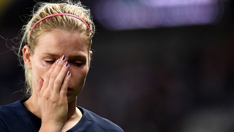 Tears roll down the face of France's forward Eugenie Le Sommer as she exits the pitch following France's loss to the United States in the Women's World Cup quarterfinals in Paris, France, on Friday, June 28.