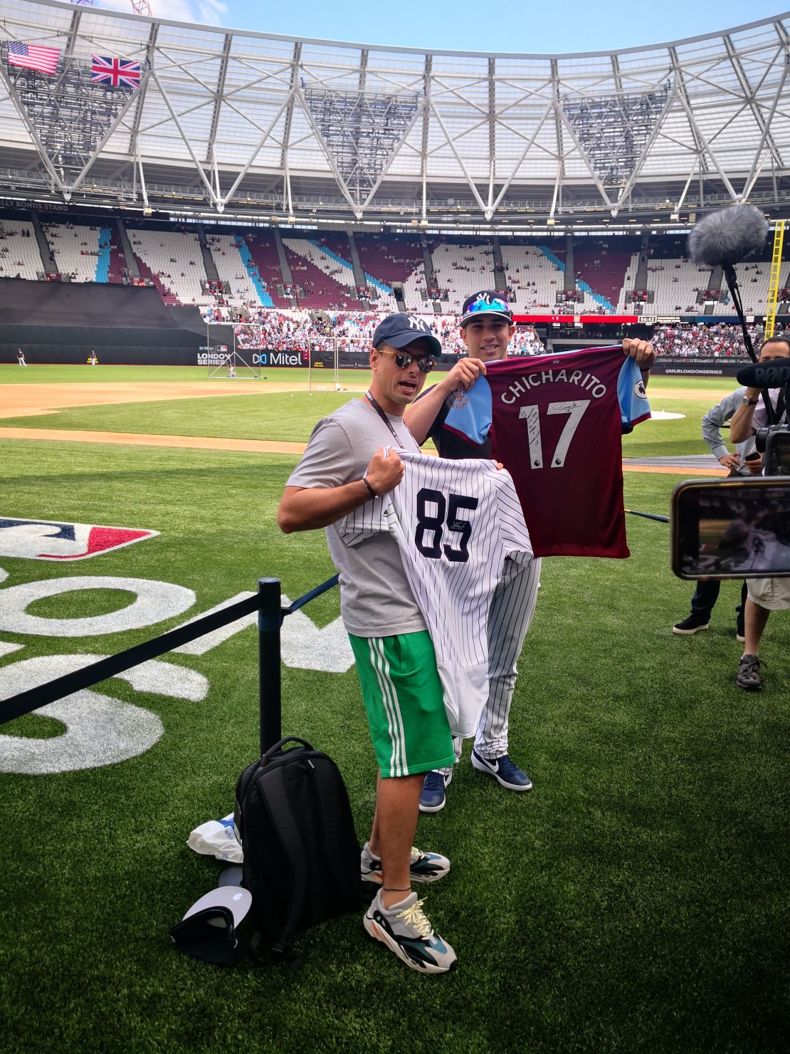 West Ham United's Mexican striker Javier Hernandez, known as Chicharito, swaps jerseys with countryman Luis Cessa, a pitcher for the New York Yankees before the meeting between the Yankees and the Boston Red Sox in London on Sunday. 