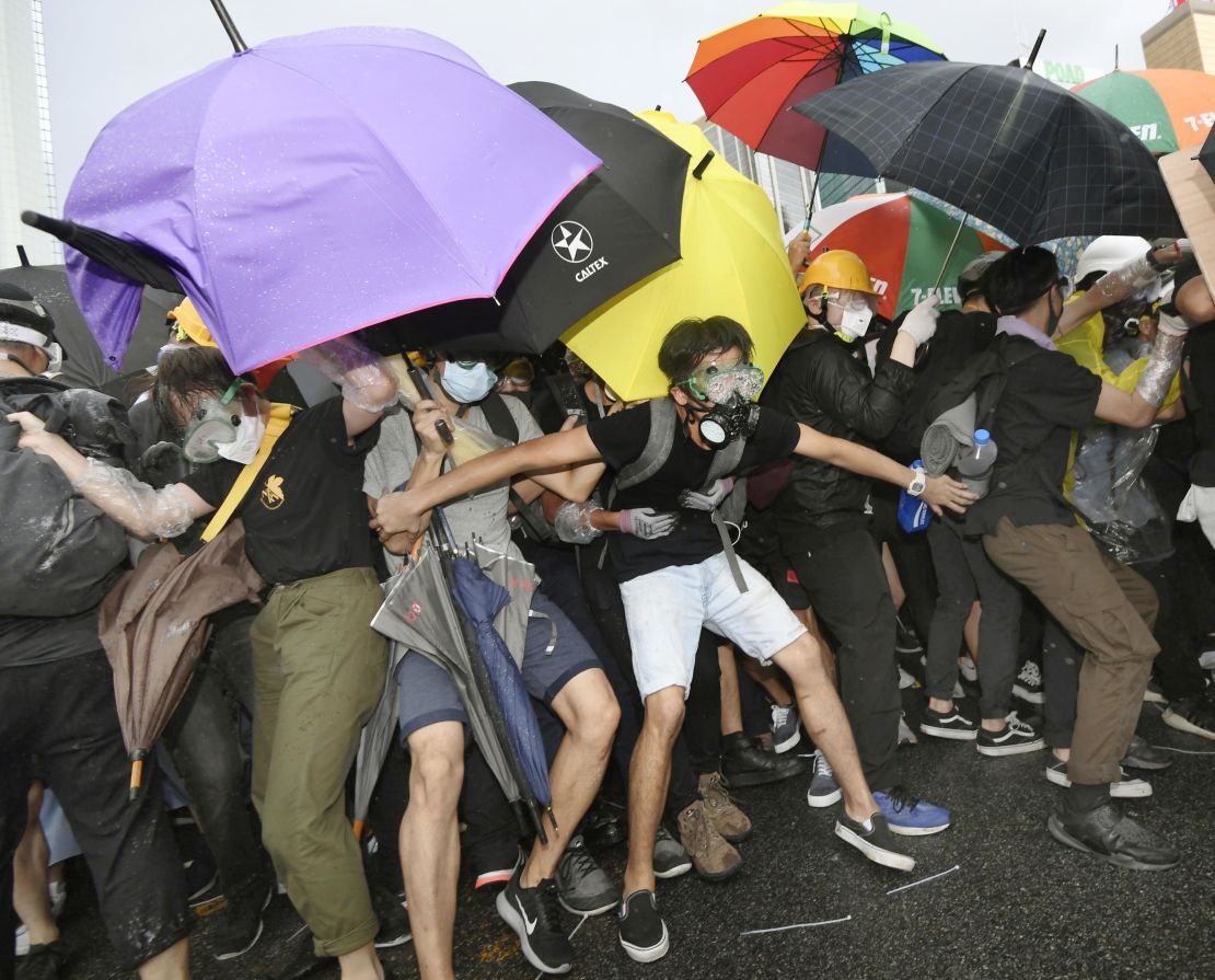 Protesters opposing Hong Kong's now suspended extradition bill face off police on July 1, 2019, near the venue in the central part of the territory of a ceremony the same day to mark the 22nd anniversary of the former British colony's handover to China.  