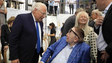 In this June 30, 2019, file photo, US Ambassador to Israel David Friedman (left) speaks with US businessman and philanthropist Sheldon Adelson (center) and his wife, Miriam, at the City of David archaeological and tourist site in east Jerusalem.
