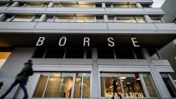 People walk in front of the headquarters of the Swiss Stock Exchange (Boerse) operated by the SIX group in Zurich on November 29, 2018. - According to a EU Commission document, for now, not enough progress on the Swiss-EU framework agreement has been made to renew the 'financial equivalency' status of the Swiss stock exchange in Europe, media reported on November 28, 2018.    (Photo credit should read FABRICE COFFRINI/AFP/Getty Images)