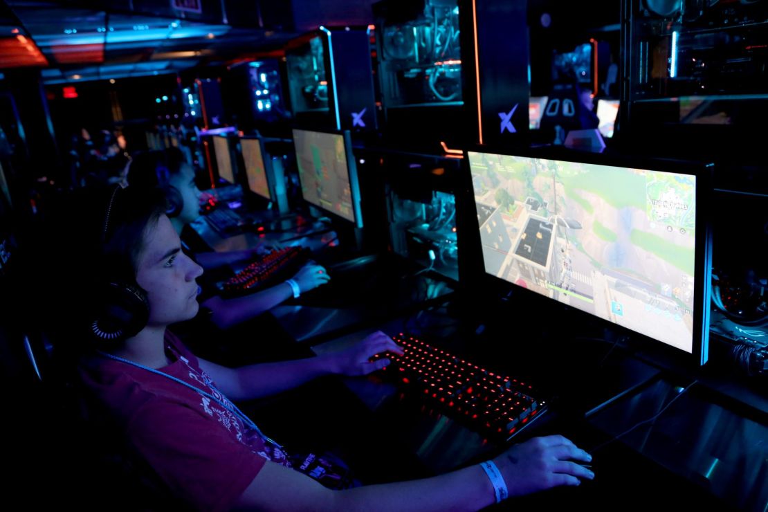 Gamers play "Fortnite" at the HyperX Esports Arena Las Vegas in Las Vegas, Nevada. Simon Property Group is partnering with  Allied Esports to create lounges for competitive video game events at its malls.