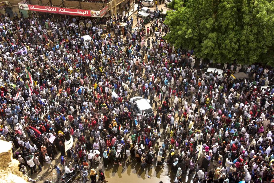 Sudanese protesters march in a mass demonstration against the country's ruling generals in the capital's twin city of Omdurman on June 30.