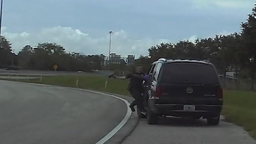 A driver caught on video dragging a deputy with his car during a ...