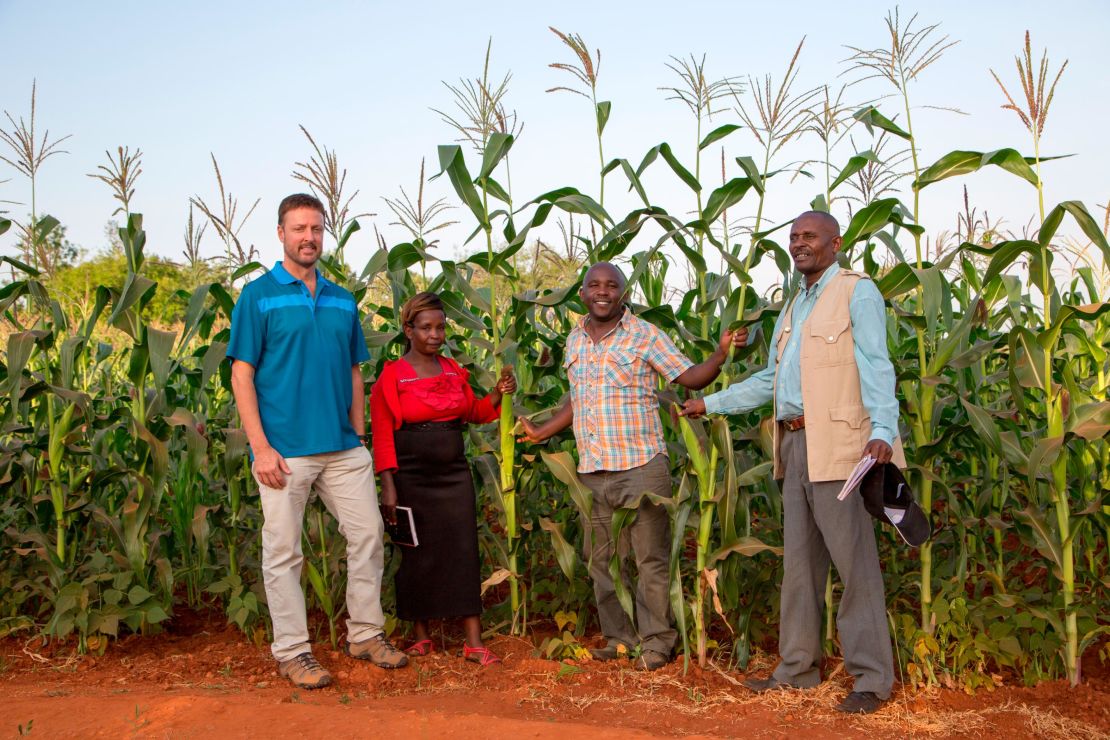 Broin with farmers in Kenya. Part of his nonprofit's mission is to teach better farming techniques to developing communities.