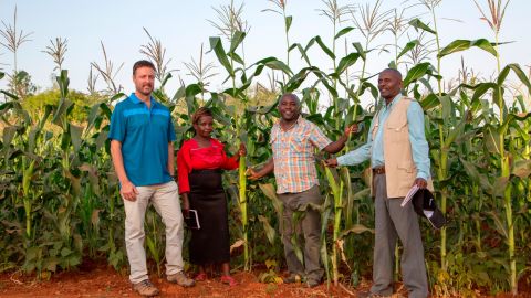 Broin with farmers in Kenya. Part of his nonprofit's mission is to teach better farming techniques to developing communities.