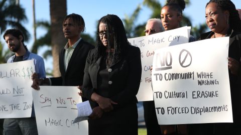 Marleine Bastien, center, protests with residents and activists against the Magic City plans.  