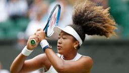 Japan's Naomi Osaka reaturns the ball to Kazakhstan's Yulia Putintseva during their women's singles first round match on the first day of the 2019 Wimbledon Championships at The All England Lawn Tennis Club in Wimbledon, southwest London, on July 1, 2019. (Photo by Adrian DENNIS / AFP) / RESTRICTED TO EDITORIAL USE        (Photo credit should read ADRIAN DENNIS/AFP/Getty Images)