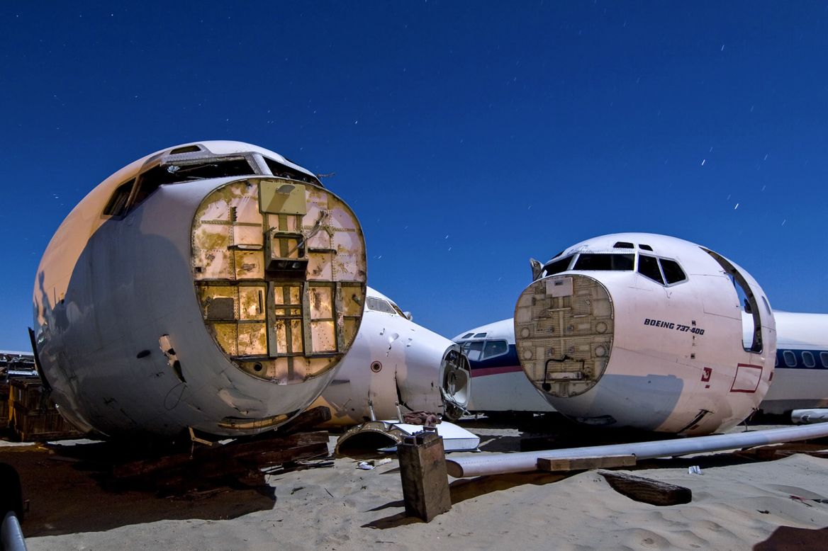 A Boeing 727, 737 and MD-80 lay derelict. Scroll through to see more images from Troy Paiva's forthcoming book, "Boneyard: SoCal's Aircraft Graveyards at Night."
